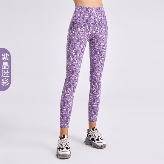 2022 Primavera y verano Nuevas polainas de yoga Tie-Dye Pantalones deportivos de cintura alta para mujeres Desgaste exterior